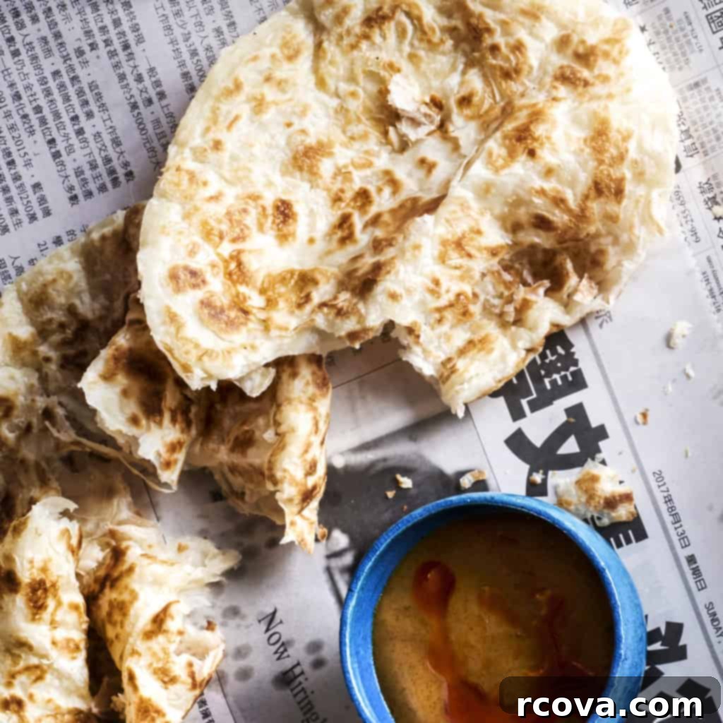 Hawkers St. Petersburg Vibrant Asian Street Food Scene 4 Malaysian Roti flatbread with spicy curry dipping sauce at Hawkers