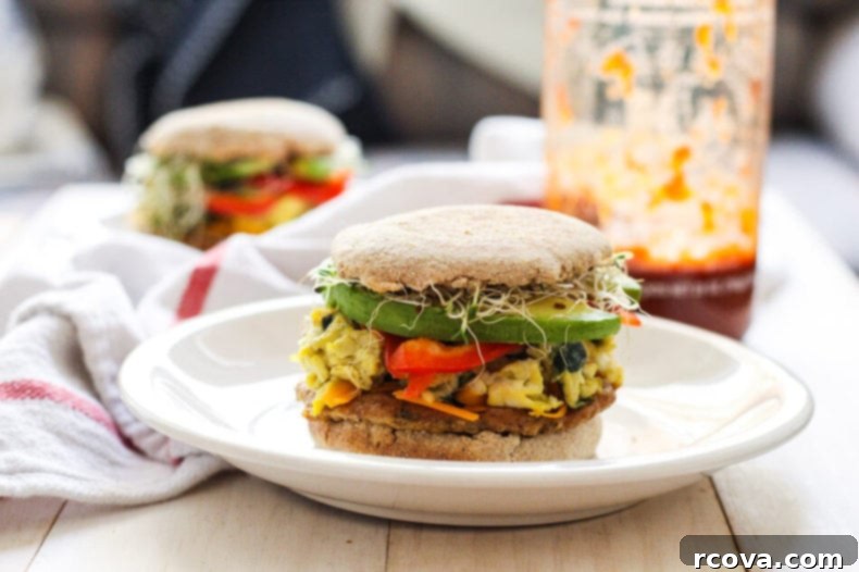Turkey Sausage Sunrise Sandwiches 6 A perfectly assembled turkey sausage breakfast sandwich, topped with avocado and microgreens, ready to be enjoyed.