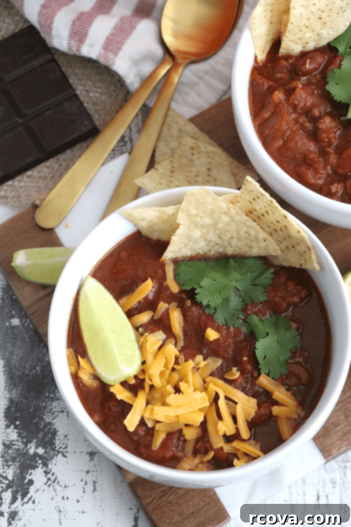 Smoldering Chocolate Chili 2 A steaming bowl of Chipotle Chocolate Chili, garnished with fresh cilantro.