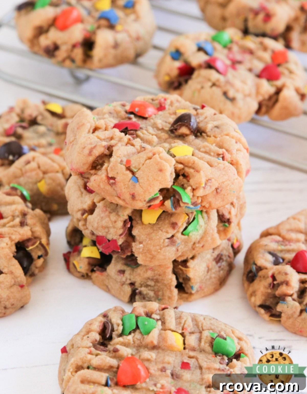 Peanut Butter M&M Cookie Perfection 5 Close-up of baked Peanut Butter M&M Cookies cooling on a wire rack, showcasing their soft texture and colorful candies.