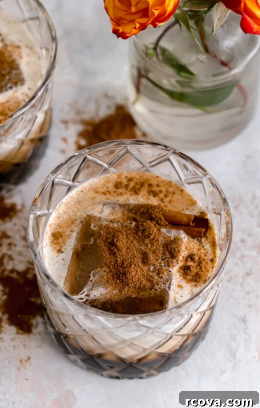 Autumn's Creamy Dream Pumpkin Spice White Russian 4 Pumpkin Spiced White Russians served in an old fashioned glass