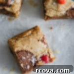 Halloween Candy Loaded Cookie Bars 7 halloween candy cookie bars with flaky sea salt on top