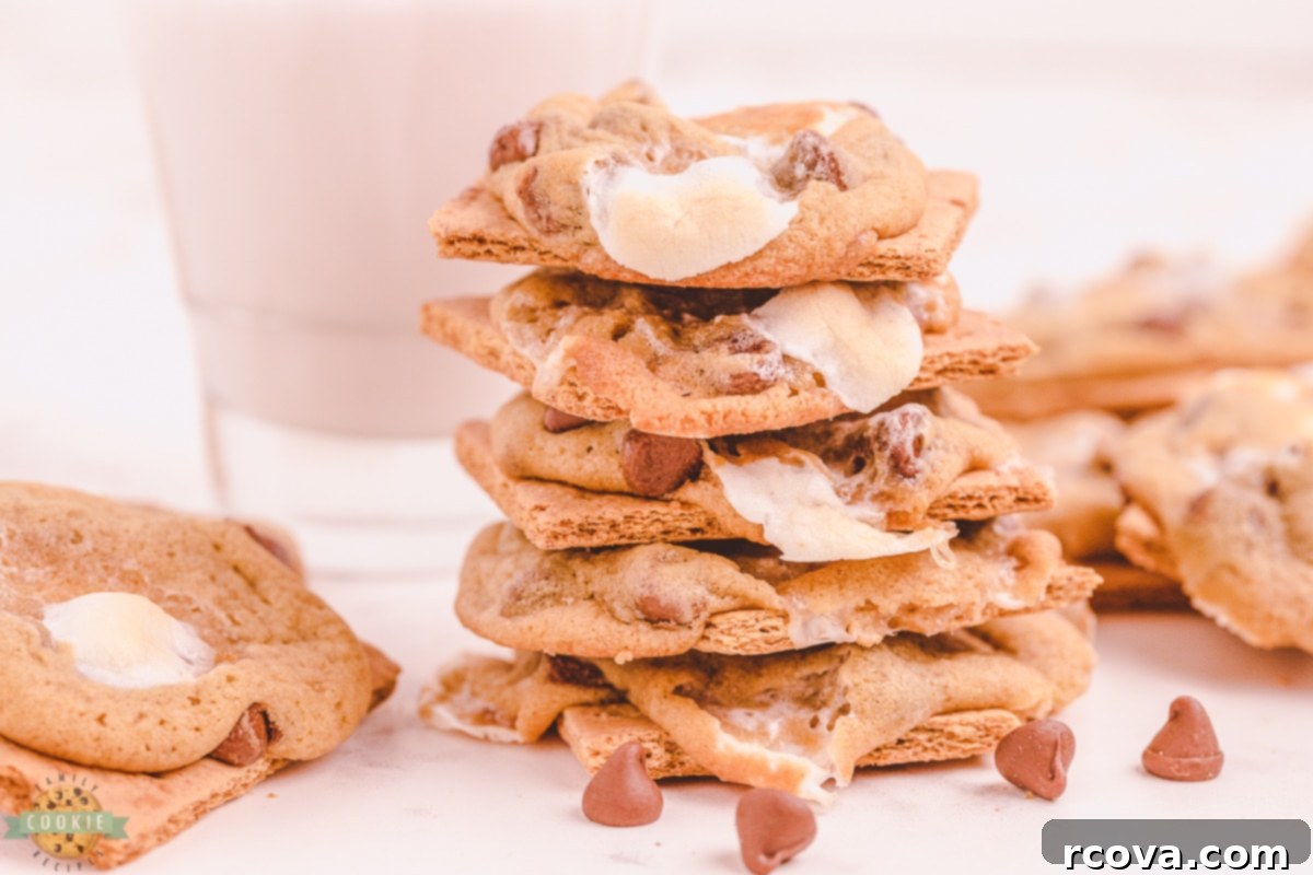Chocolate Chip S'mores Cookies 7 A stack of warm s'mores chocolate chip cookies, freshly baked and ready to be served