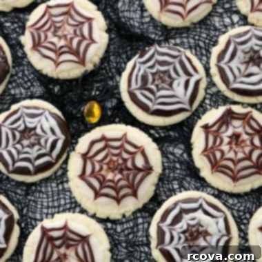 Spooky Spiderweb Cookies 5 Cobweb Halloween Cookies with striking black and white icing design