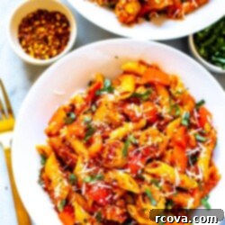 Delicious One-Pot Spicy Penne Arrabiata with Sausage One-Pot Spicy Penne Arrabiata with turkey sausage and red bell peppers