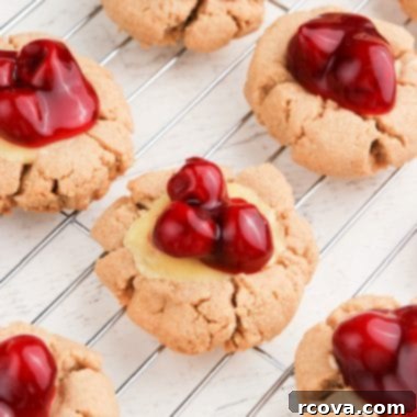 Cheesecake Stuffed Cookies 7 Cheesecake Cookies with cherry topping