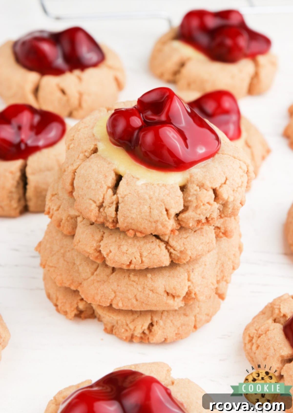 Cheesecake Stuffed Cookies 9 Cheesecake Cookies are graham cracker cookies baked with a simple cheesecake filling and topped with your favorite fruit or pie filling.