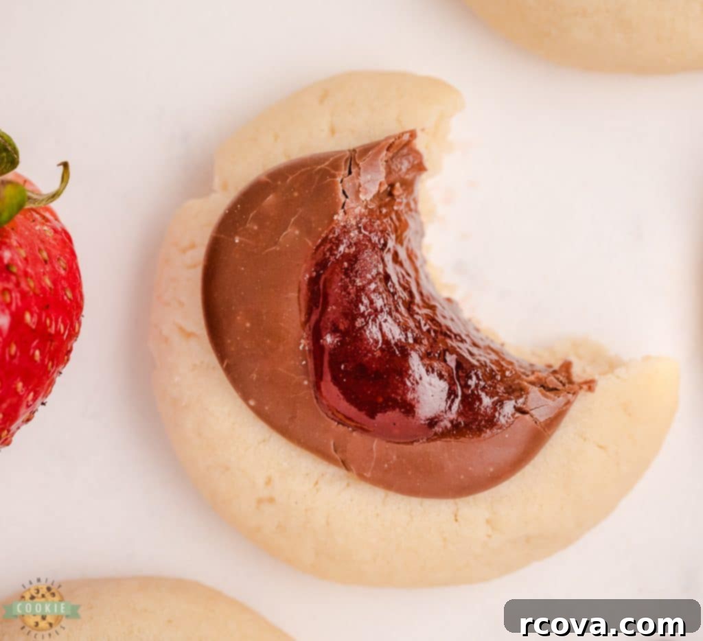 Decadent Strawberry Chocolate Thumbprints 4 bite of a chocolate strawberry jam cookie