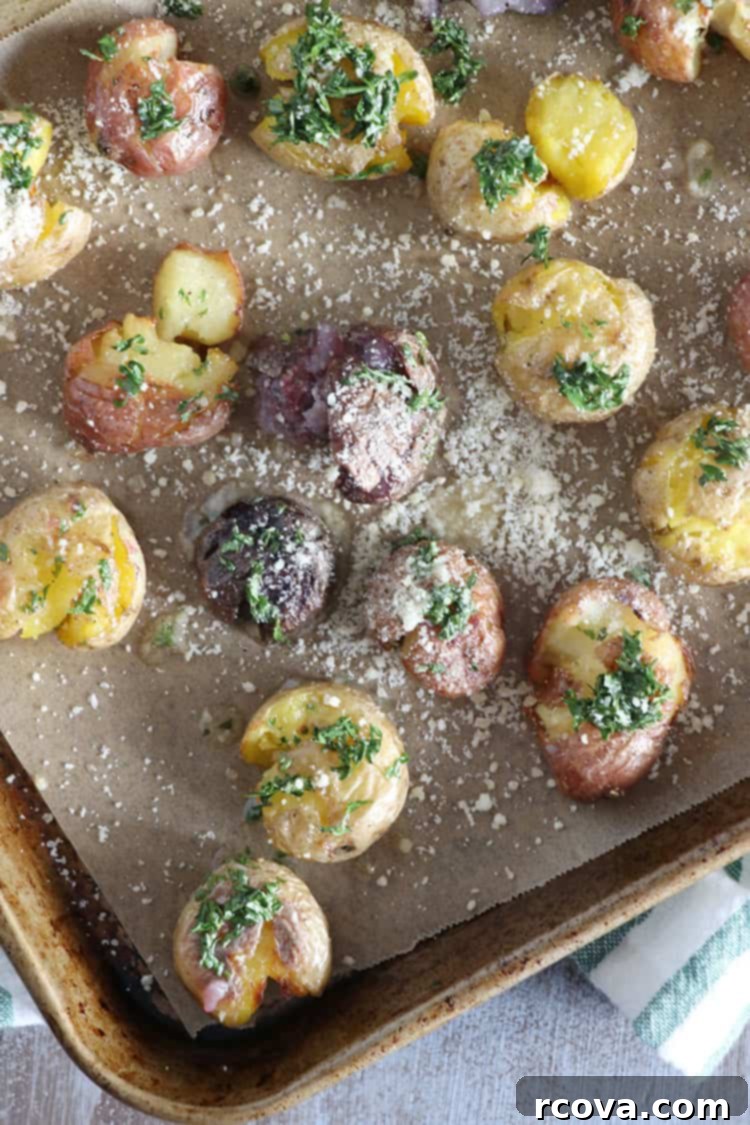 Crispy Garlic Smashed Potatoes Roasted in Duck Fat 4 Platter of golden roasted garlic smashed potatoes
