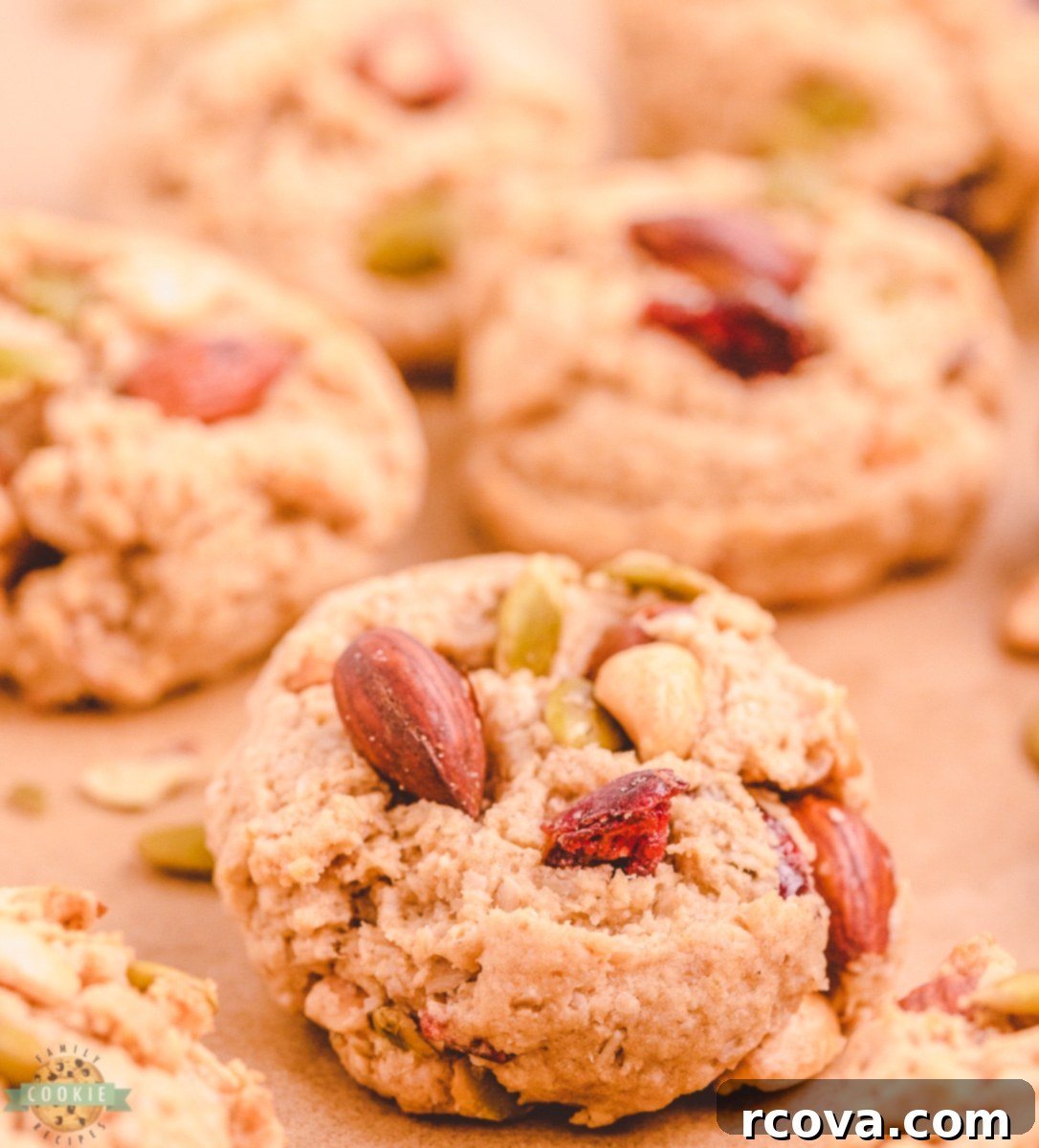 Trail Mix Peanut Butter Cookies: The Adventurous Bite 4 A bowl of cookie dough with trail mix, ready for baking.