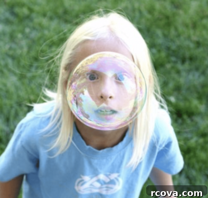 Key Lime Pie Cookie Delights 12 a happy child with blonde hair playing with bubbles