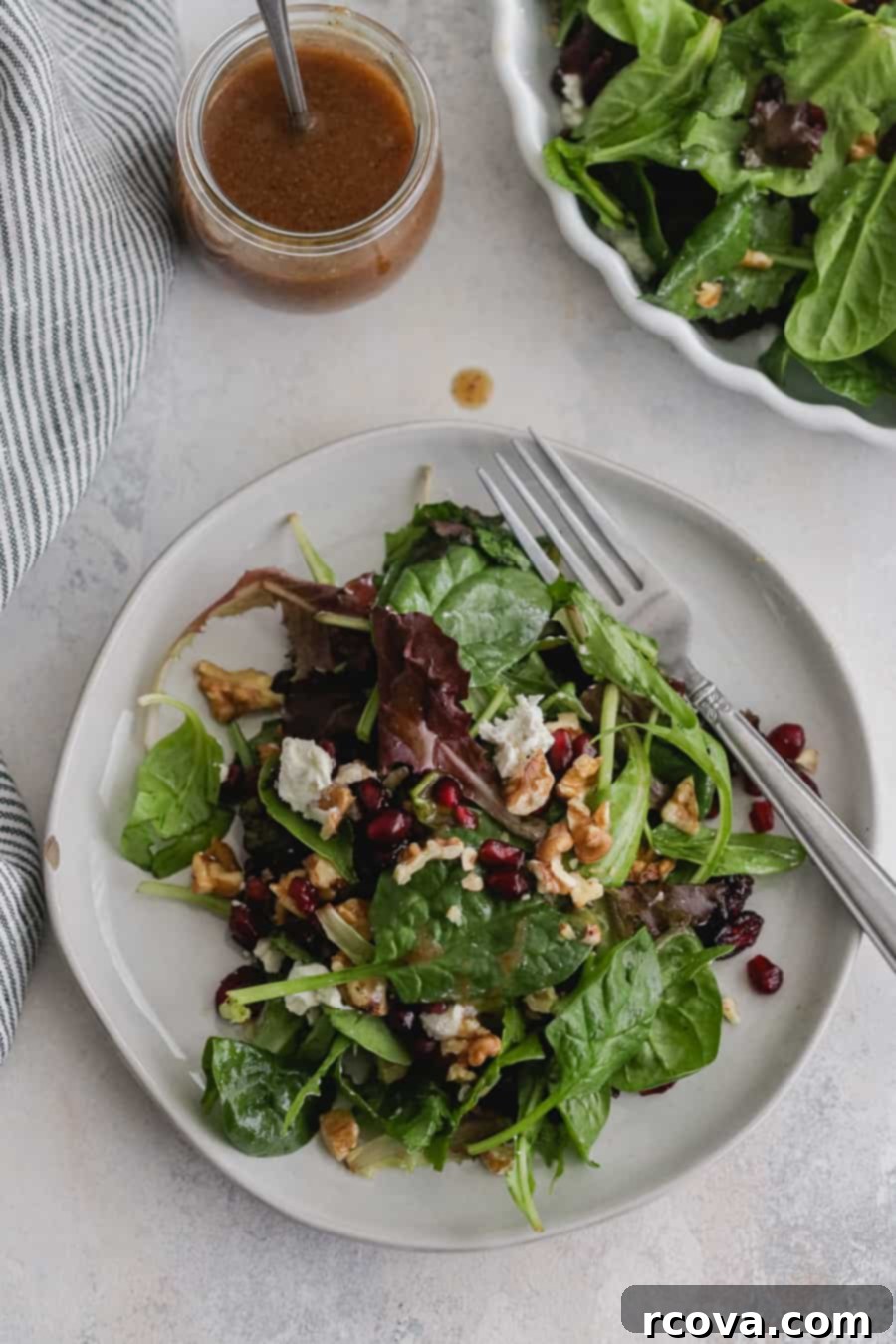 Crisp Winter Salad with Sweet Fig Balsamic 2 Winter Salad with Fig Jam Balsamic Vinaigrette, featuring fresh greens, goat cheese, walnuts, cranberries, and pomegranate