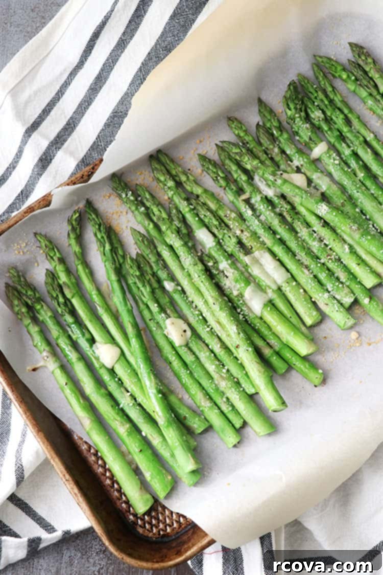 Crispy Parmesan Asparagus Spears 2 Freshly roasted asparagus spears with garlic and parmesan shavings