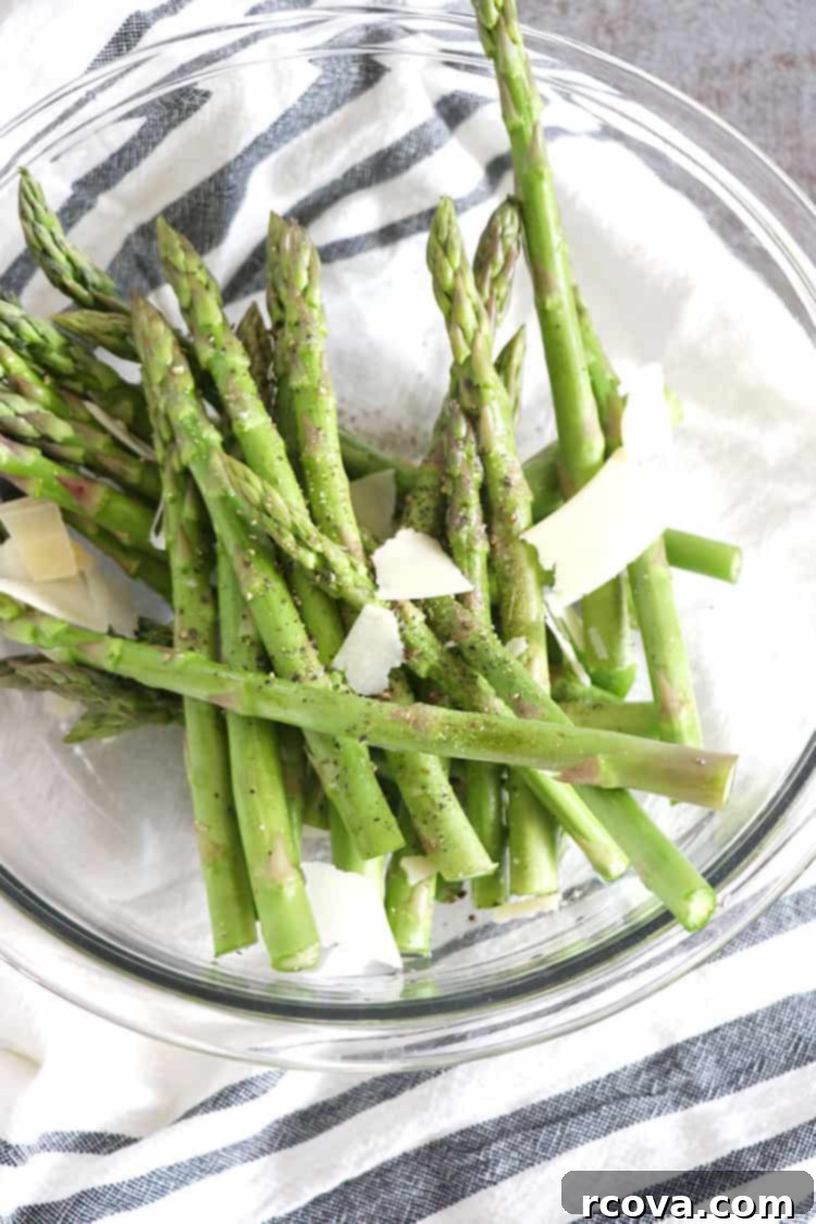 Crispy Parmesan Asparagus Spears 3 Close-up of roasted asparagus with melted parmesan