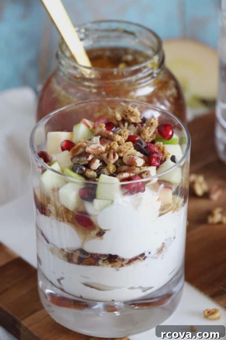 Cozy Winter Parfaits 5 Two artfully arranged winter fruit parfaits in glasses, ready to be enjoyed as a healthy and festive meal.
