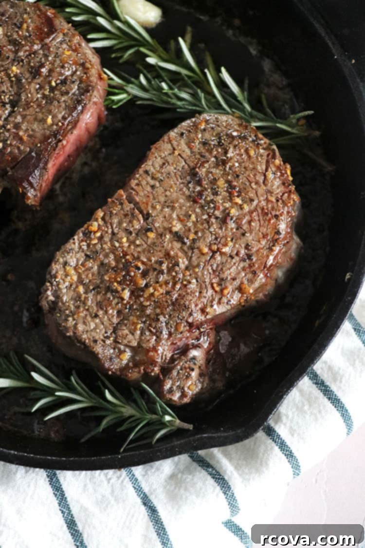 Date Night Filet Mignon Perfection 5 Close-up of filet mignon cooking in a cast iron skillet, showing the sear