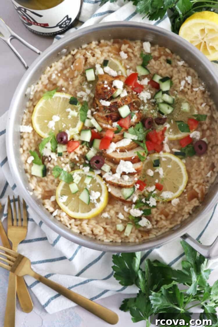 Zesty One-Pot Lemon Feta Chicken Risotto 3 Close-up of Greek Lemon Chicken Risotto in a pan with wooden spoon