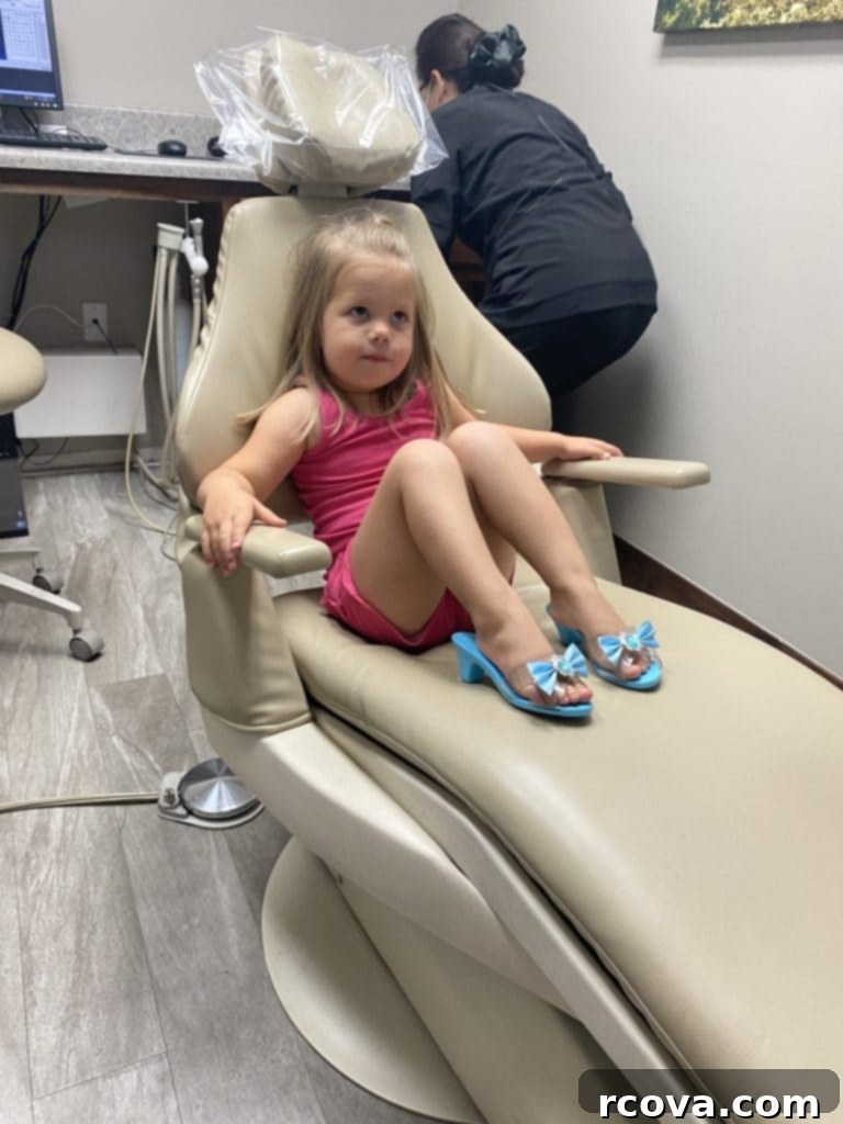 Gooey Chocolate Marshmallow Cookies 14 A young girl smiling in pink high heels at a dentist's office
