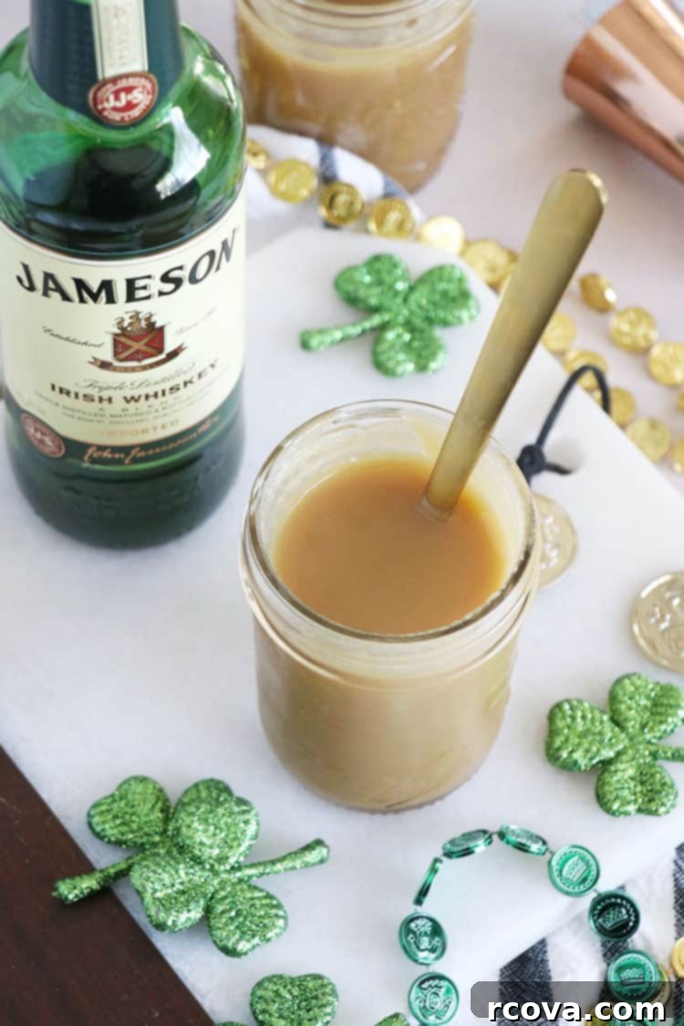Decadent Whiskey Caramel 2 Lush, golden Caramel Whiskey Sauce in a glass jar, perfect for dessert toppings
