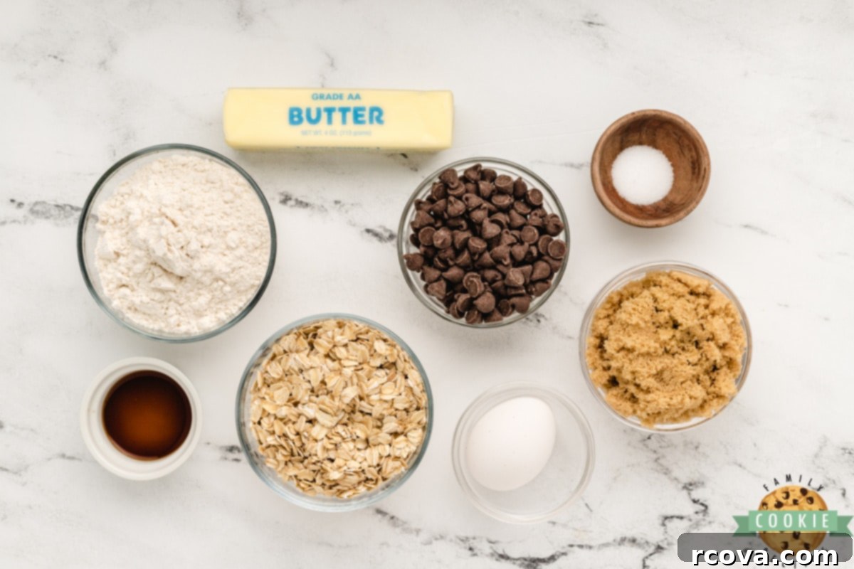 Easy Microwave Oatmeal Chocolate Chip Cookies 4 Array of essential ingredients for making Microwave Oatmeal Chocolate Chip Cookies, including butter, sugar, flour, oats, and chocolate chips.
