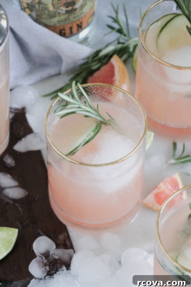 Herbal Grapefruit Gin Sparkler 4 Close-up of a Pink Grapefruit Gin Fizz cocktail in a styled glass.