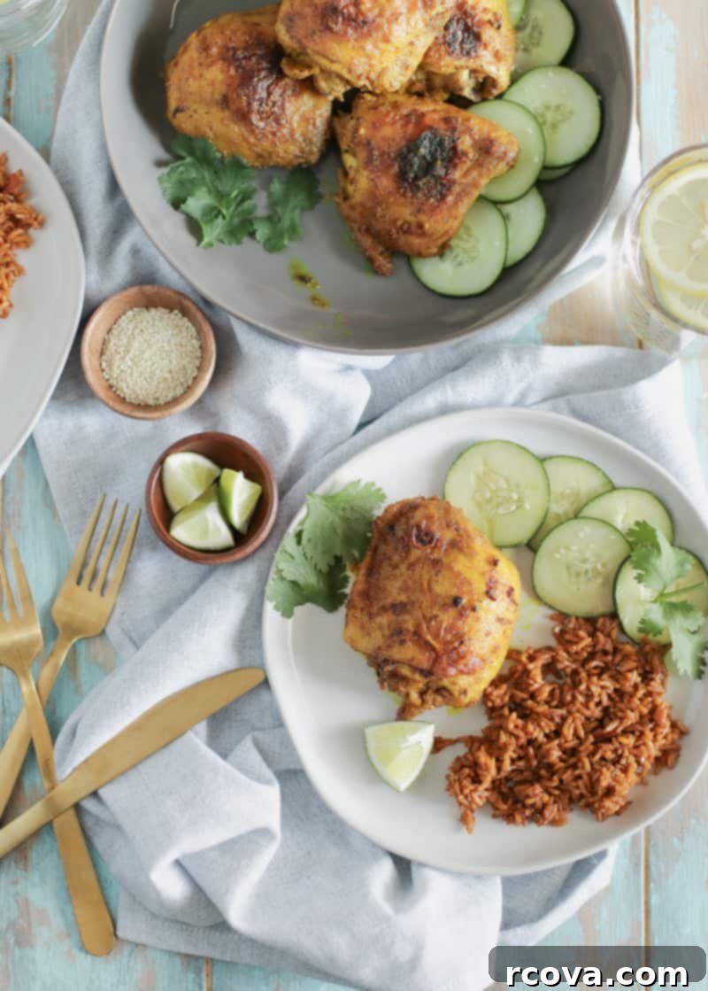 Crispy Golden Turmeric Chicken Thighs 2 Close-up of golden, crispy turmeric ginger chicken thighs fresh from the oven, showcasing their vibrant color and texture.