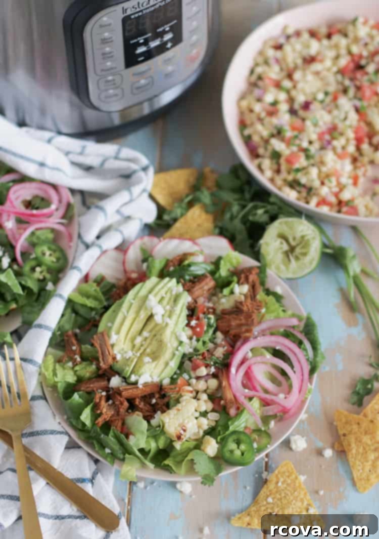 Instant Pot Shredded Beef Barbacoa Low Carb and Paleo 3 Close-up of shredded beef barbacoa, showcasing its rich color and tender texture, ideal for tacos and burrito bowls.