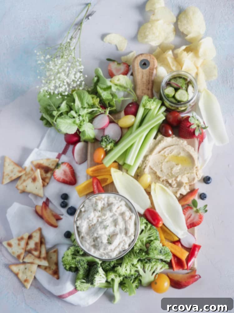 Sun Kissed Veggie Spread 2 Summer Crudite Snack Board. Raw and fresh summer veggies, paired with your favorite dip is anything but boring - A Summer Crudité board is the perfect beginning to any weekend bbq!
