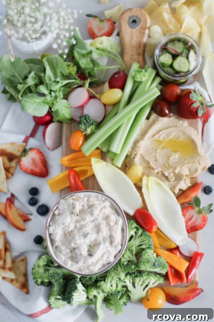 Sun Kissed Veggie Spread 4 Summer Crudite Snack Board. Raw and fresh summer veggies, paired with your favorite dip is anything but boring - A Summer Crudité board is the perfect beginning to any weekend bbq!