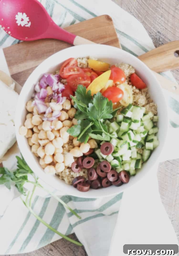 Vibrant Mediterranean Quinoa Salad 3 Close-up of Mediterranean Quinoa Salad with chickpeas, feta, and vegetables.