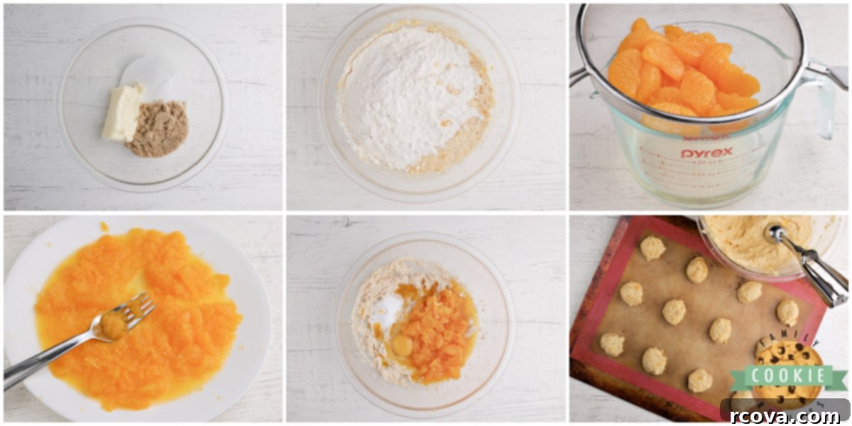 Zesty Mandarin Glazed Cookies 4 A baking sheet filled with raw cookie dough scooped onto parchment paper, ready for baking.