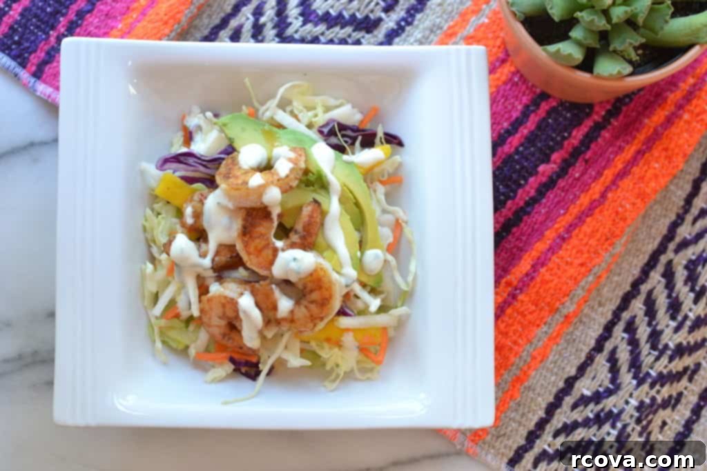 Tropical Mango Jicama Shrimp Taco Bowls 2 Fresh Mango Jicama Shrimp Taco Bowls - A healthy and quick summer dinner option that is Paleo and Whole30 friendly.