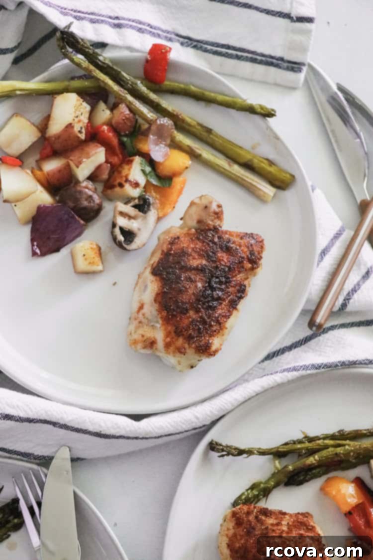 Smoky Paprika Sheet Pan Chicken 5 Full sheet pan with roasted paprika chicken and vegetables, fresh from the oven, ready for serving