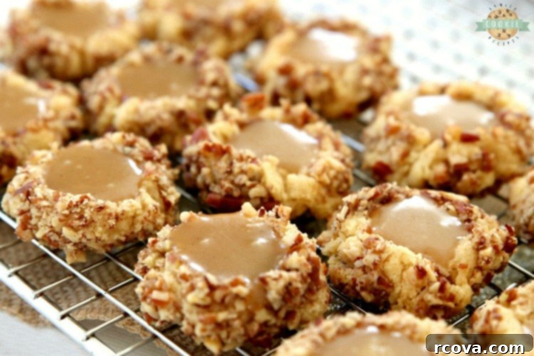 Gooey Caramel Thumbprint Delights 3 Caramel Thumbprint Cookies are a classic shortbread cookie rolled in pecans, baked & filled with warm caramel. Buttery Christmas cookies that everyone loves seeing at holiday cookie exchanges!