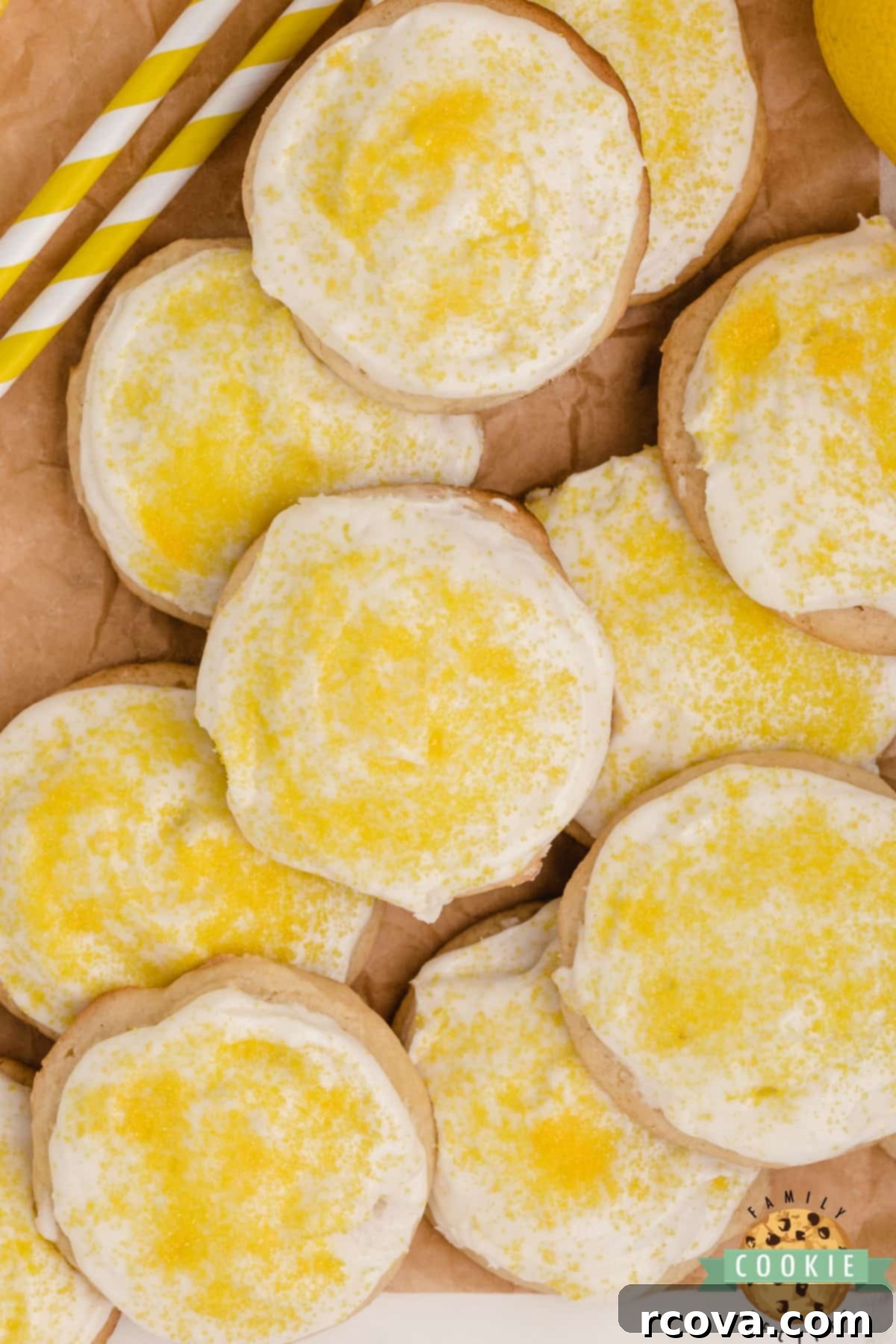 Glazed Lemonade Cookies 9 Beautifully frosted Frosted Lemonade Cookies arranged on a serving plate, showcasing their zesty appeal.