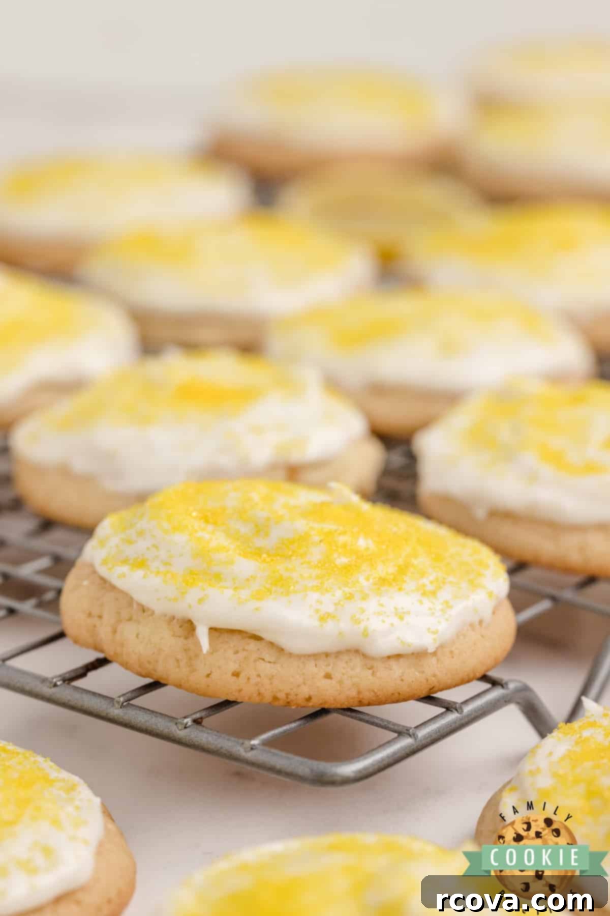 Glazed Lemonade Cookies 10 A close-up shot of the perfectly frosted Frosted Lemonade Cookies, highlighting their delightful texture and vibrant color.