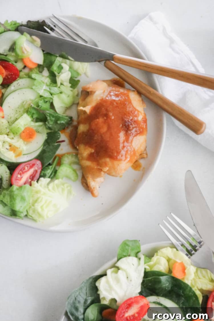 One-Pan Paleo Spicy Honey Mustard Chicken Thighs 2 Flavorful Spicy Honey Mustard Chicken Thighs cooked in a skillet for a quick weeknight meal