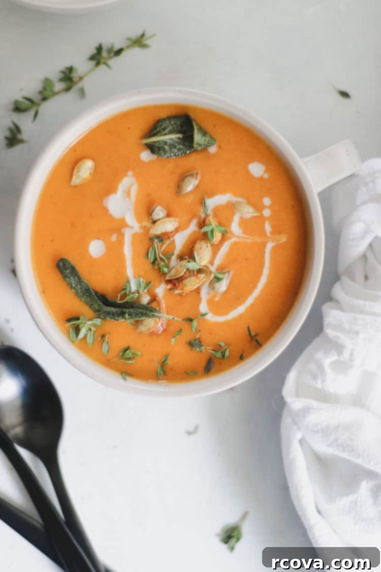 Velvety Dairy-Free Butternut Squash Soup with Carrots and Warming Spices 8 A close up of the creamy texture of the dairy-free butternut squash soup