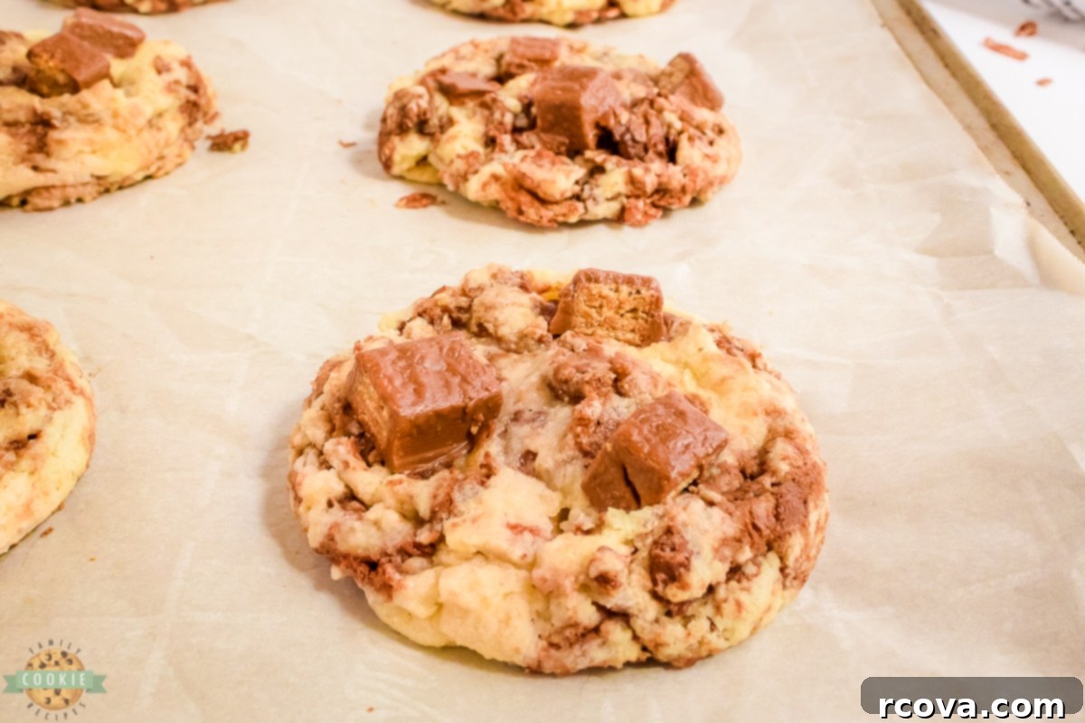 Decadent Kit Kat Cookies 8 Close-up of baked cookies topped with Kit Kat candy pieces