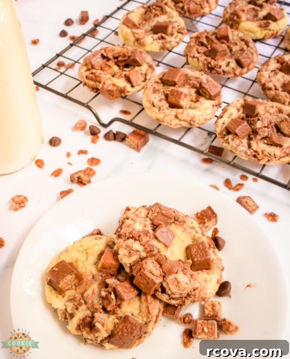 Decadent Kit Kat Cookies 9 Process of adding Kit Kat candy bars to raw cookie dough before baking