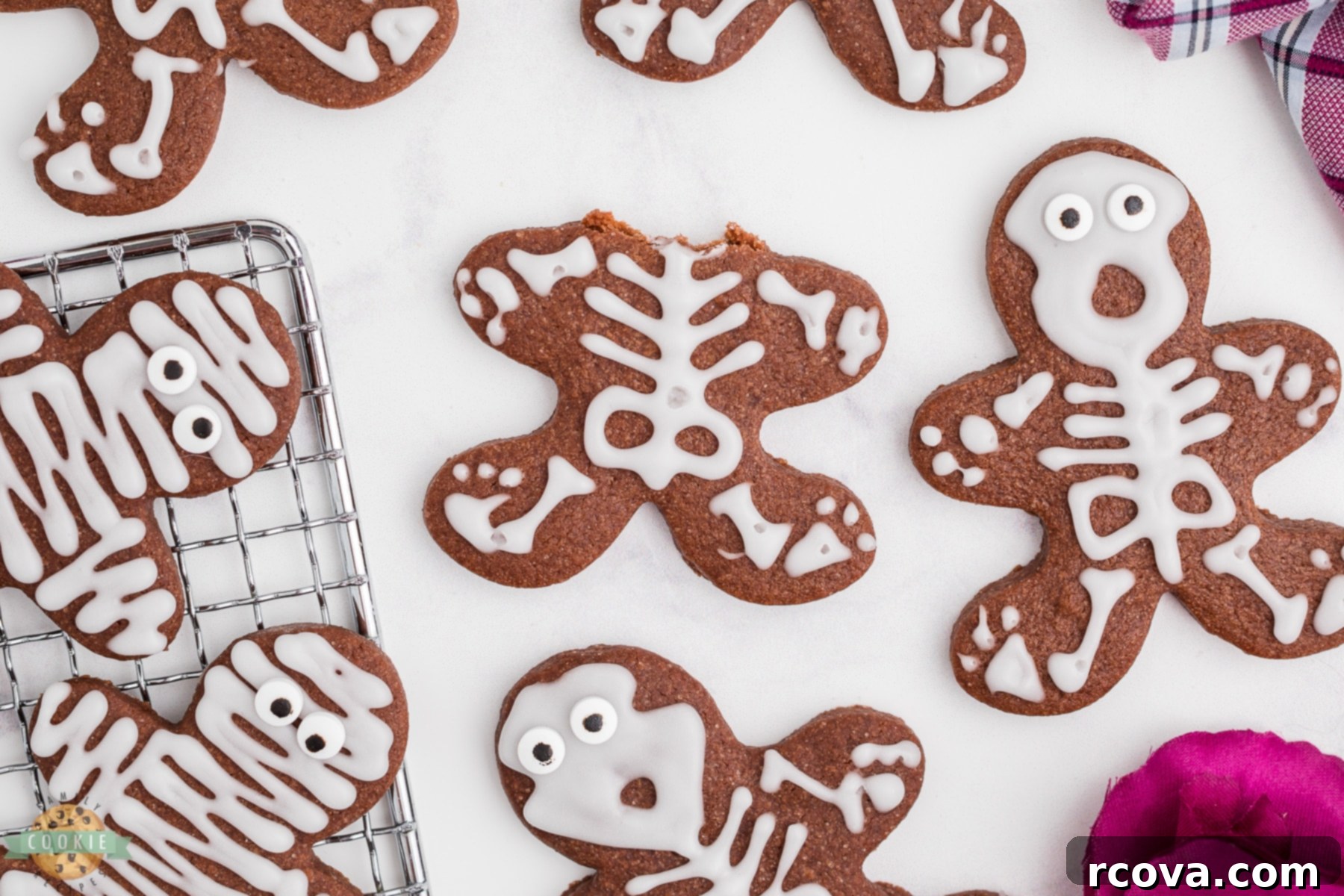 Sweetly Spooky Skeletons 5 skeleton cookie with the head bitten off