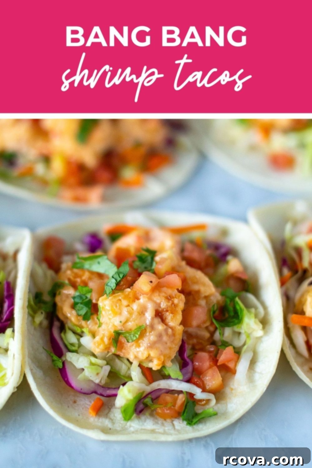 Spicy Bang Bang Shrimp Tacos 11 Bang bang shrimp tacos, with text overlay that says 'Bang Bang Shrimp Tacos' on a rustic wooden background