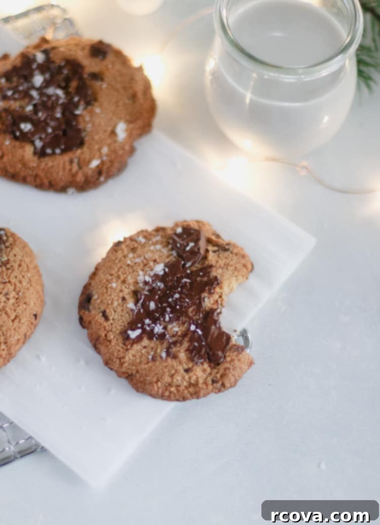 Paleo Gluten Free Almond Flour Chocolate Chunk Cookies 4 baked almond flour chocolate chunk cookies with melted chocolate