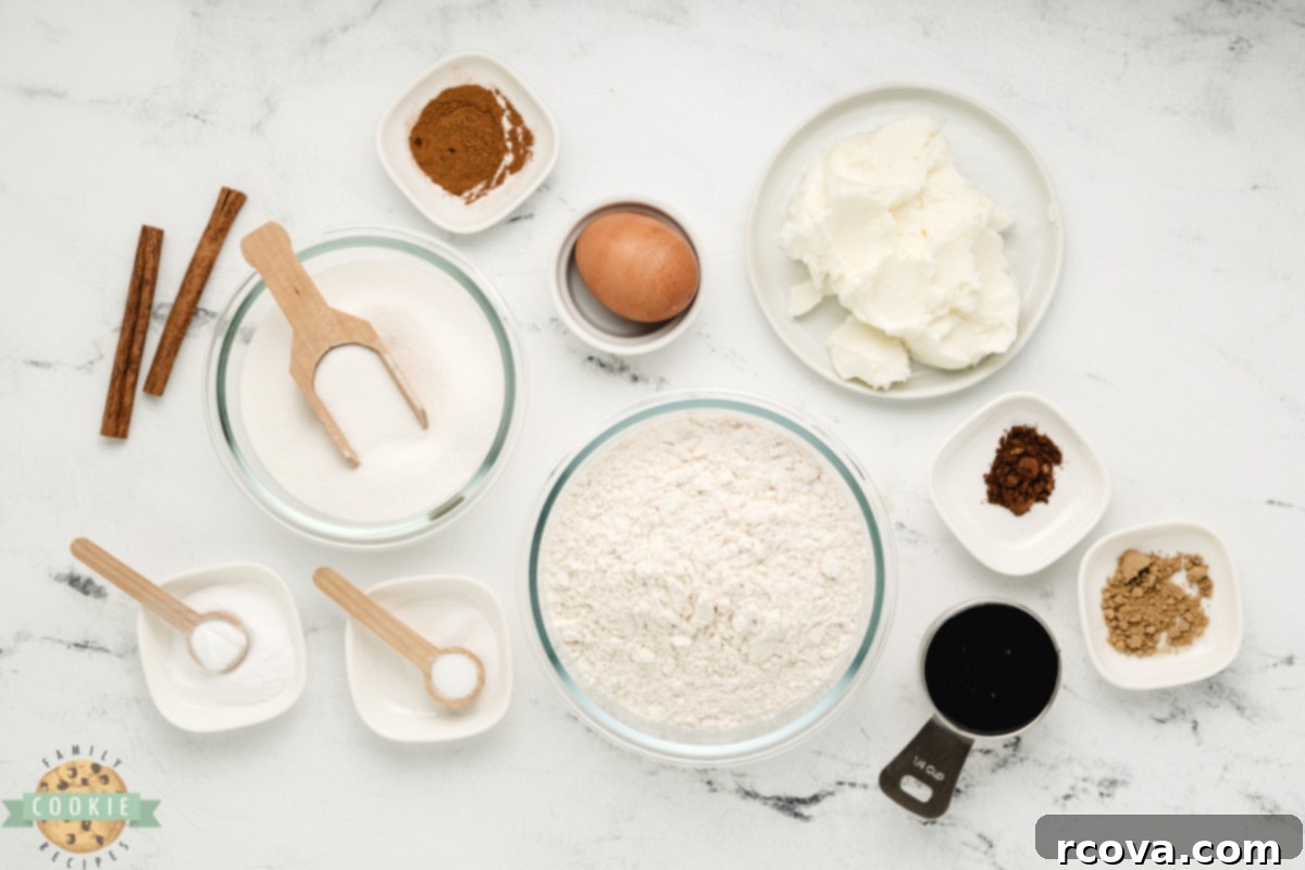 Cozy Ginger-Spiced Cookies 3 Essential ingredients for making Soft Gingerbread Cookies, including flour, granulated sugar, shortening, rich molasses, an egg, and a blend of warm spices like cinnamon, cloves, and ginger.