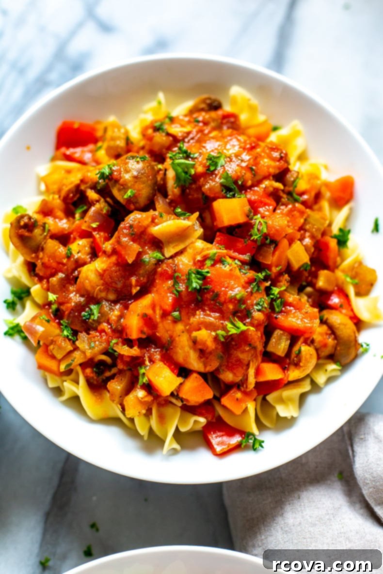 Rustic Slow Cooker Chicken Cacciatore 8 Slow Cooker Chicken Cacciatore in a bowl, showing the rich sauce, vegetables, and tender chicken, ready to be enjoyed.