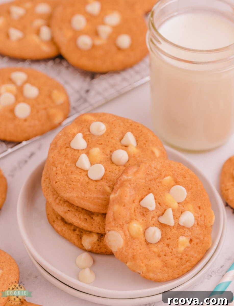 Heavenly Butterscotch Pudding Cookies 3 butterscotch pudding cookies with milk on a plate