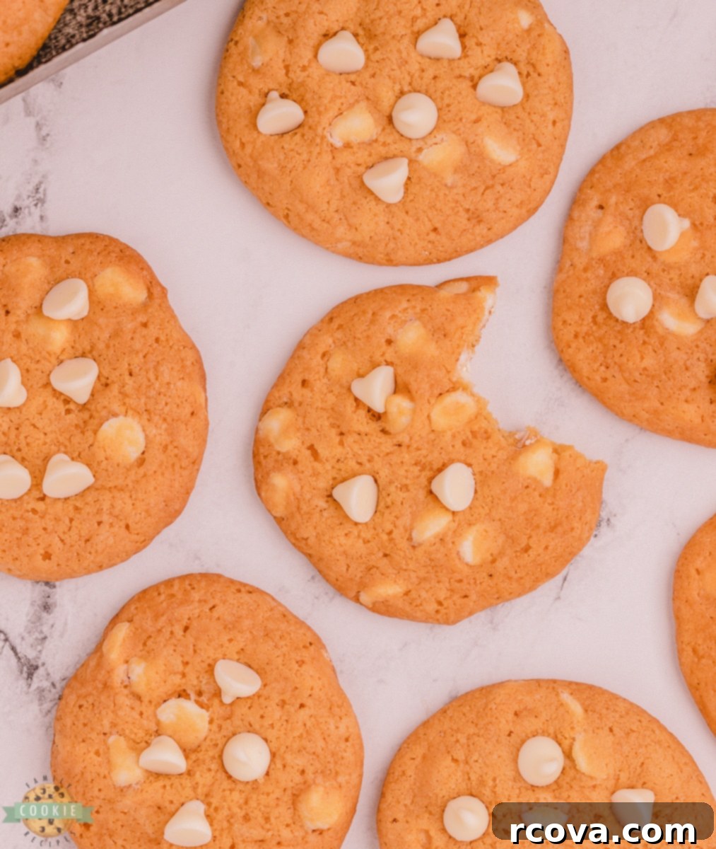Heavenly Butterscotch Pudding Cookies 4 bite out of a butterscotch pudding cookie with white chocolate chips
