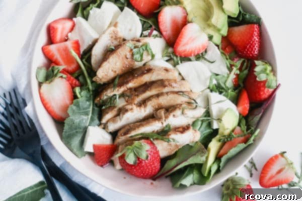 Luscious Strawberry Caprese Chicken Salad with Maple Balsamic Vinaigrette 8 Assorted fresh salad ingredients including strawberries, mozzarella, and avocado