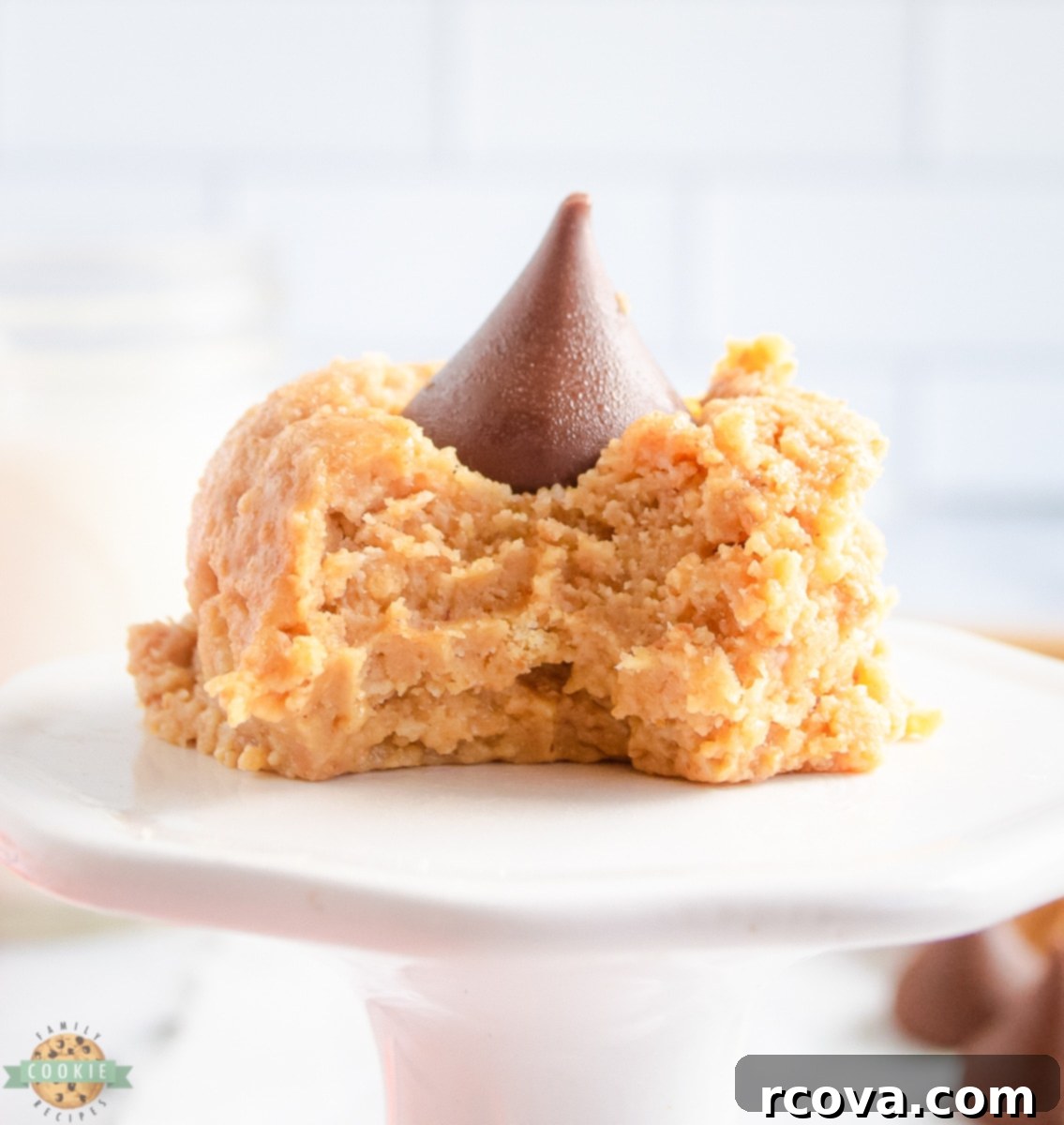 Effortless Peanut Butter Delights 3 a delightful no bake peanut butter cookie with a bite taken out, showing the creamy texture and chocolate center