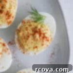 Instant Pot Deviled Eggs Fast & Fabulous 9 Classic Deviled Eggs made easily in the Instant Pot, garnished with paprika, perfect for parties and gatherings. #whole30 #paleo #instantpotrecipes